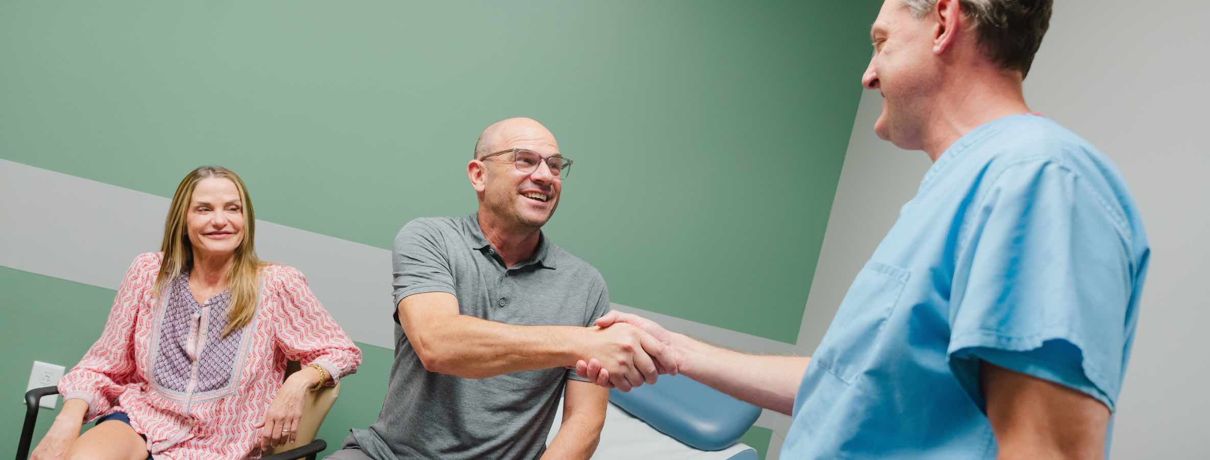 Doctor shaking patient's hand