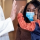 Pediatric Patient High Fiving Georgia Urology Doctor