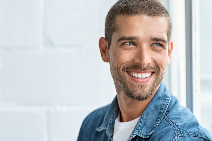 Smiling man with infertility issues